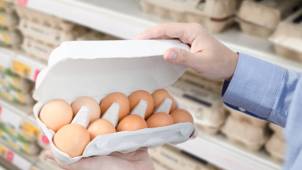 man buying eggs