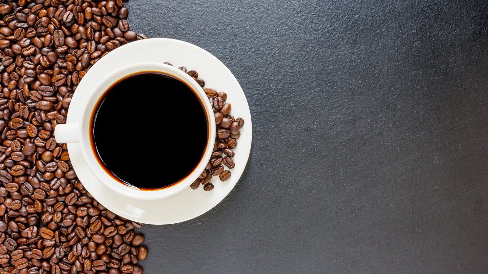 Coffee cup with beans 