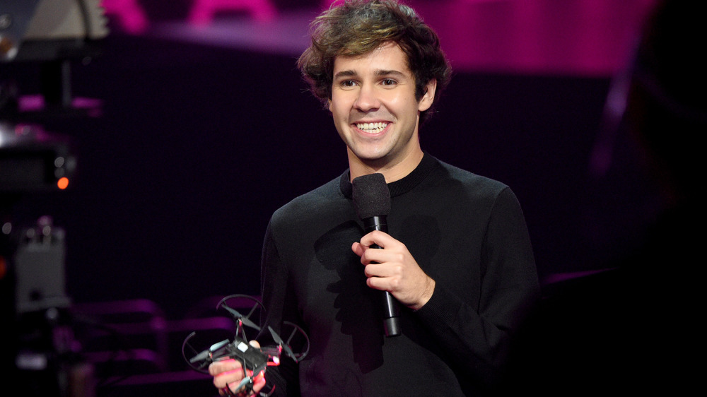 David Dobrik speaking into microphone