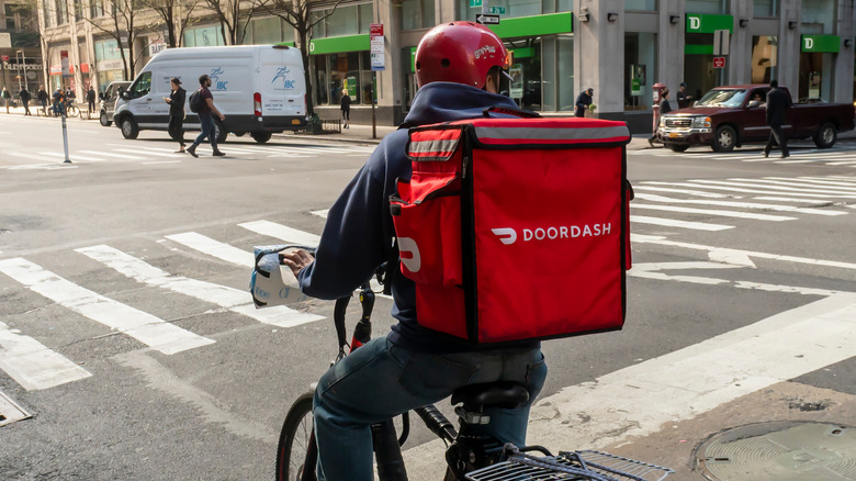 DoorDash delivery person on bike