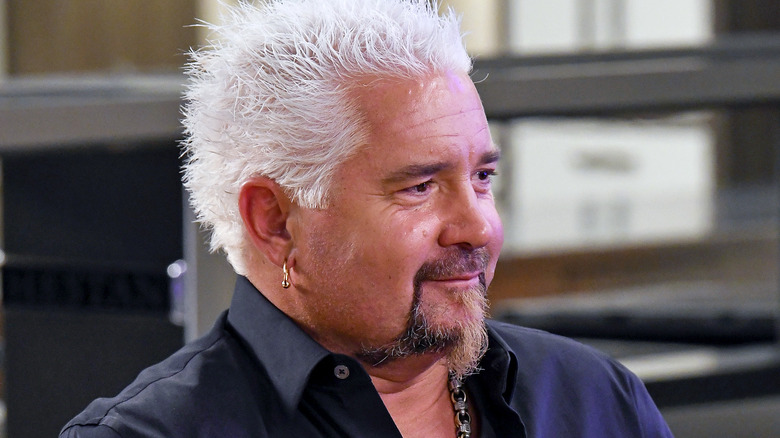 Guy Fieri looking into the distance