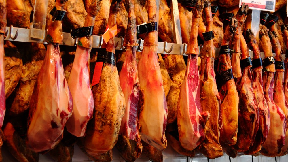 Iberico ham legs hanging 