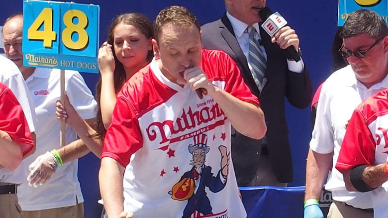 Joey Chestnut eating hotdogs