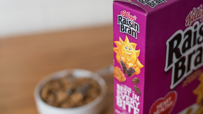 Raisin Bran box with bowl of cereal 