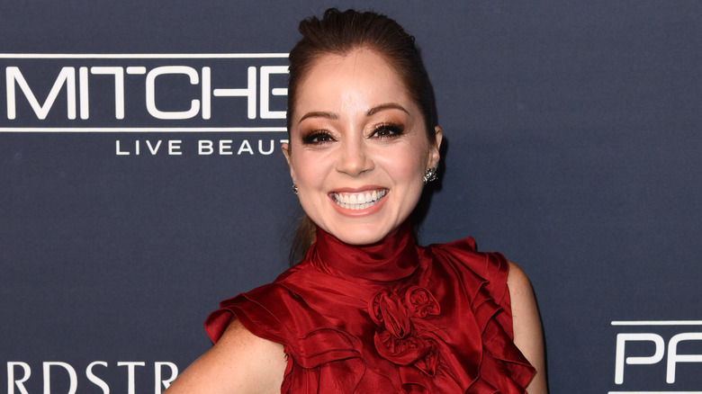 Marcela Valladolid in a red dress