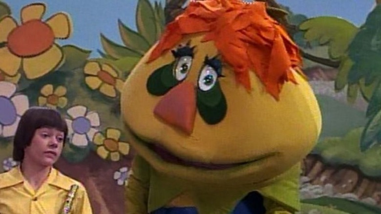 H.R. Pufnstuf on set with child