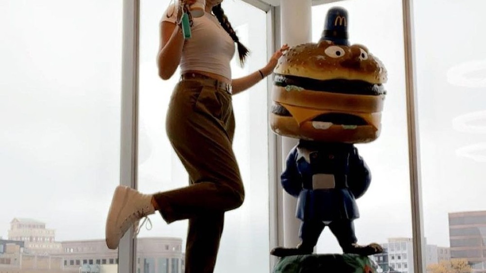 A woman and an Officer Big Mac Statue