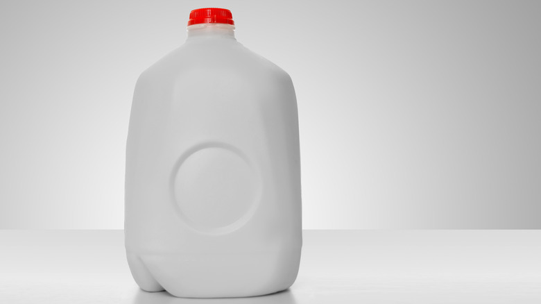 Gallon milk jug with dimple