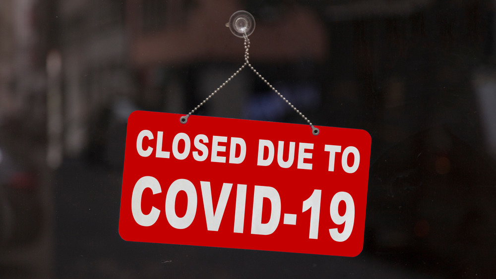 Closed due to COVID-19 sign