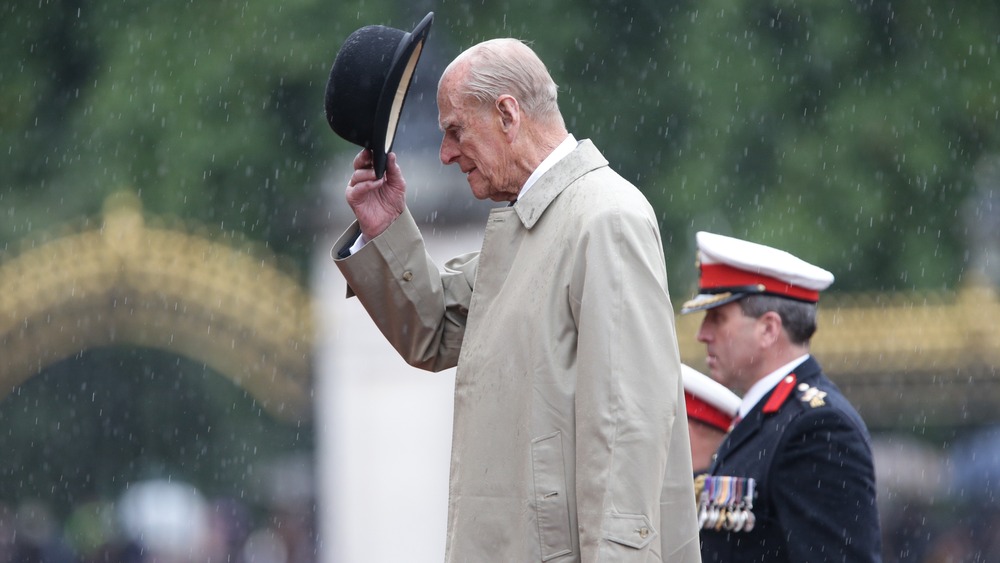 Prince Philip raising his hat