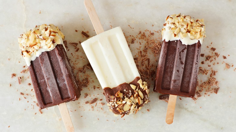 Jello Pudding Pops made with a mold and topped with nuts