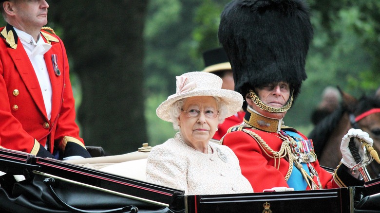 Queen Elizabeth II and Prince Philip on carriage