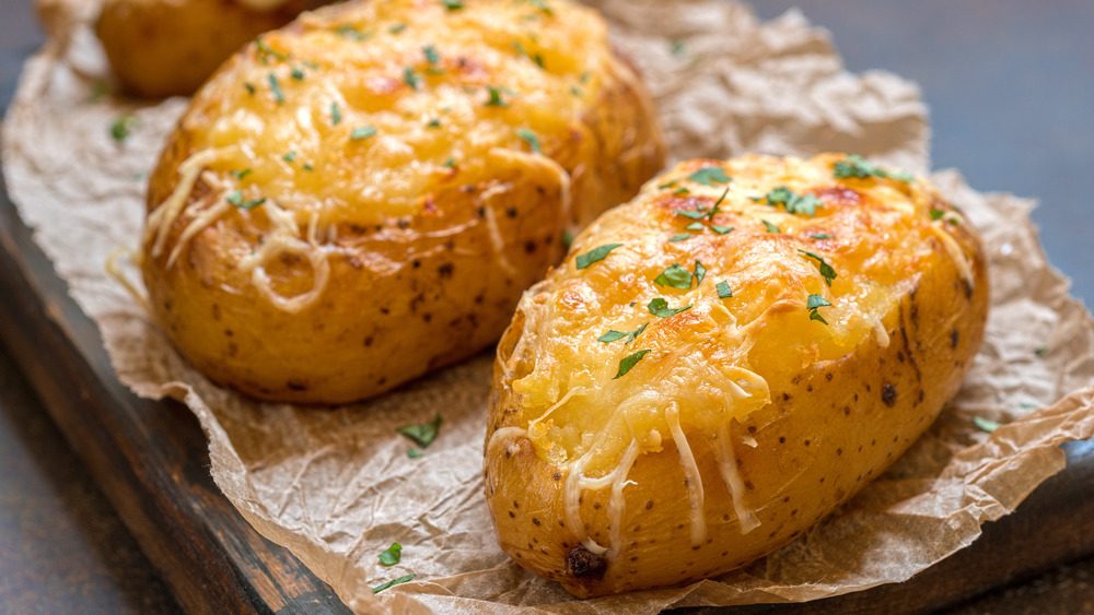 Baked potatoes, cheese and chives