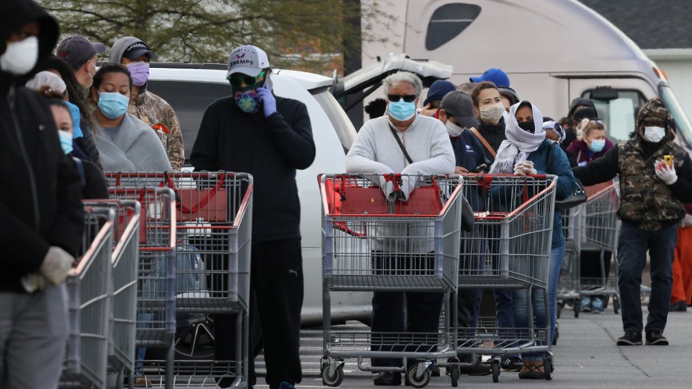 Costco customers lining up wearing face masks