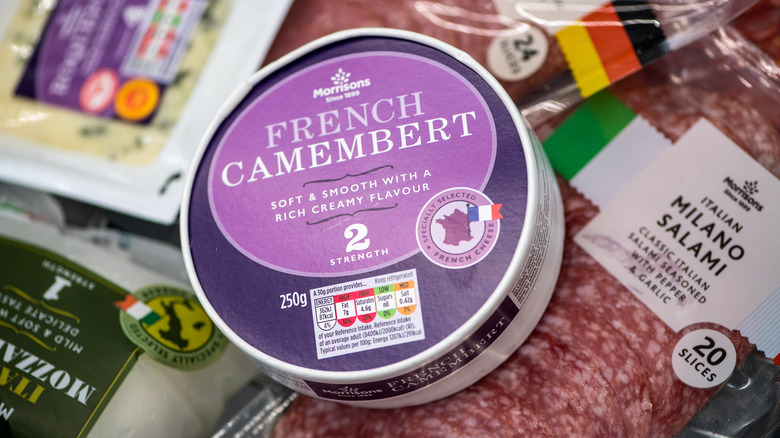 French camembert cheese in a purple package