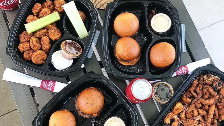 table filled with delivered TGU Fridays' food