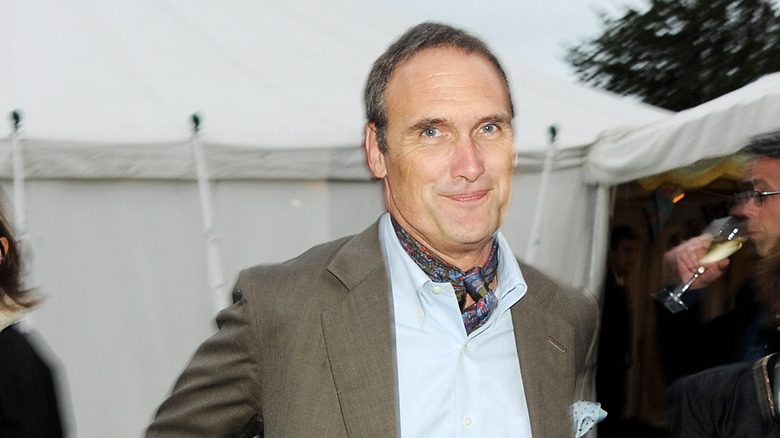 AA Gill wearing a suit