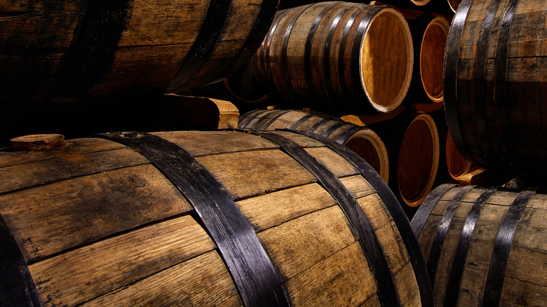 Stacked whisky barrels and casks