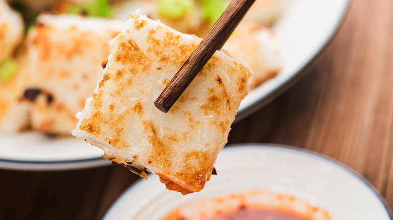 turnip cake dipped in chili sauce