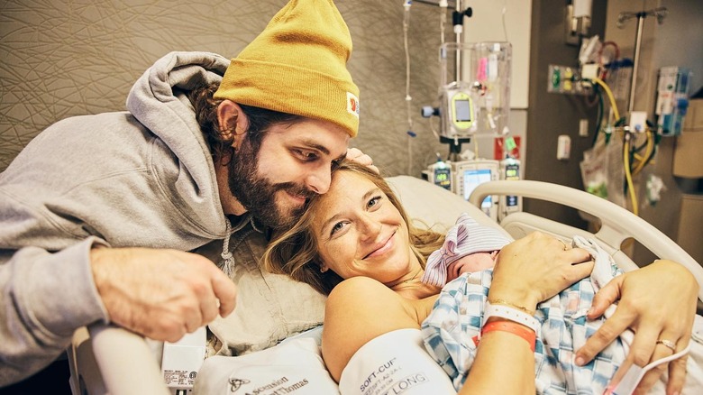 Thomas Rhett with wife Lauren and new baby