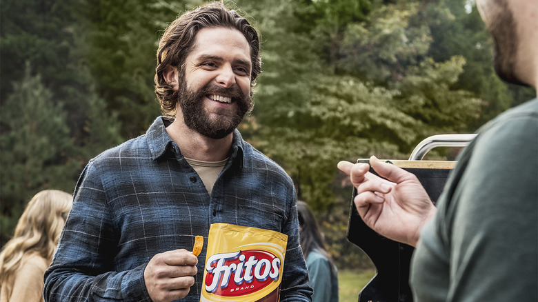 Thomas Rhett with bag of Fritos