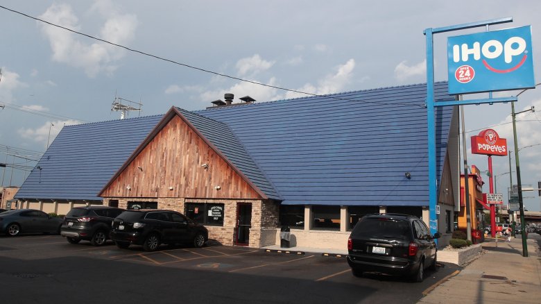 An IHOP with an empty parking lot