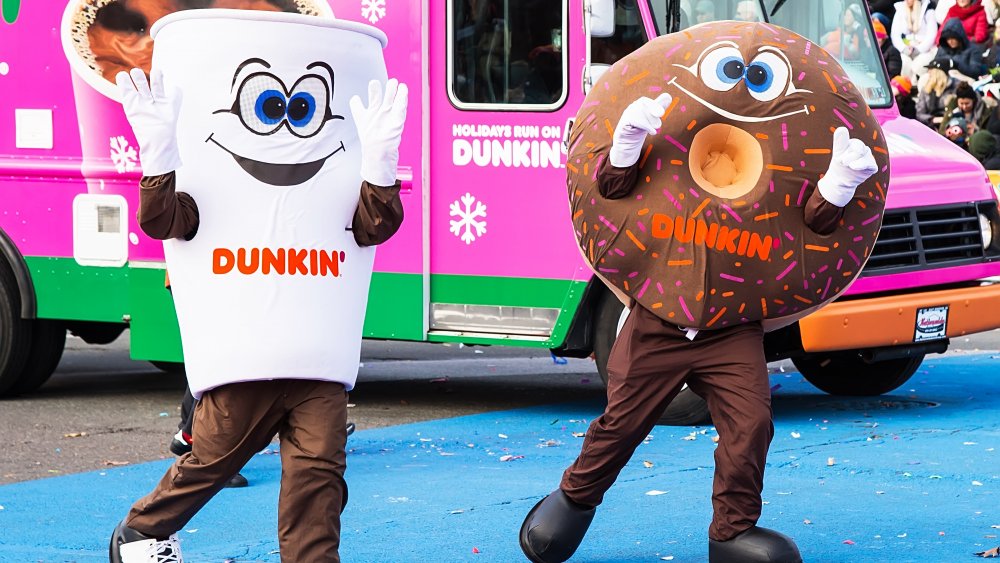 Employee rights in the land of late capitalism, or two workers dressed up as mascots to spend their Thanksgiving tooling down a parade line.