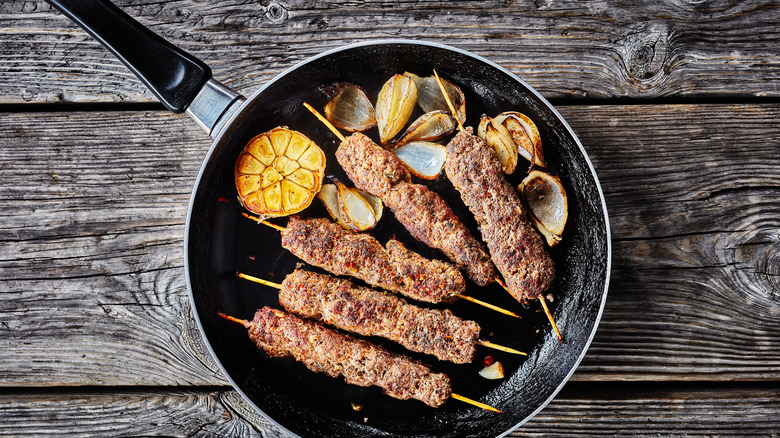 Skillet on a wooden background