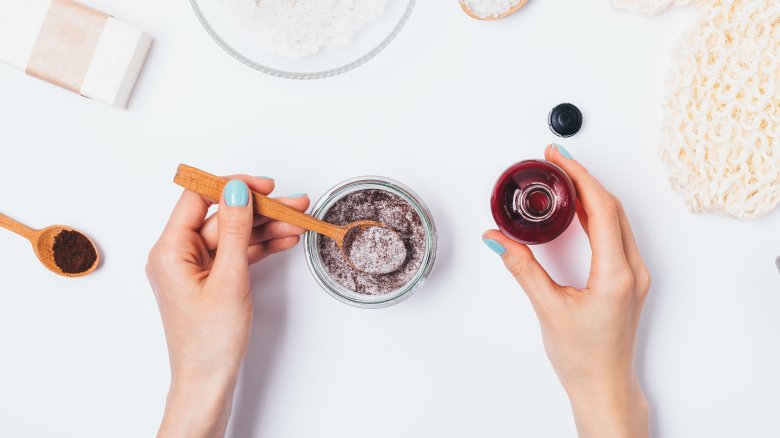 woman preparing skin scrub