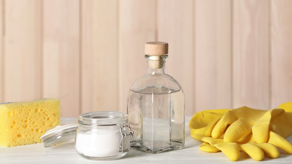 Cleaning solution with eggshells, baking soda, and vinegar