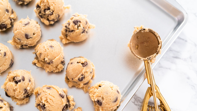 Baking sheet and cookie dough scooper