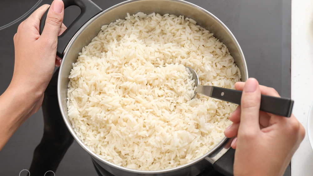 Stirring rice on the stove