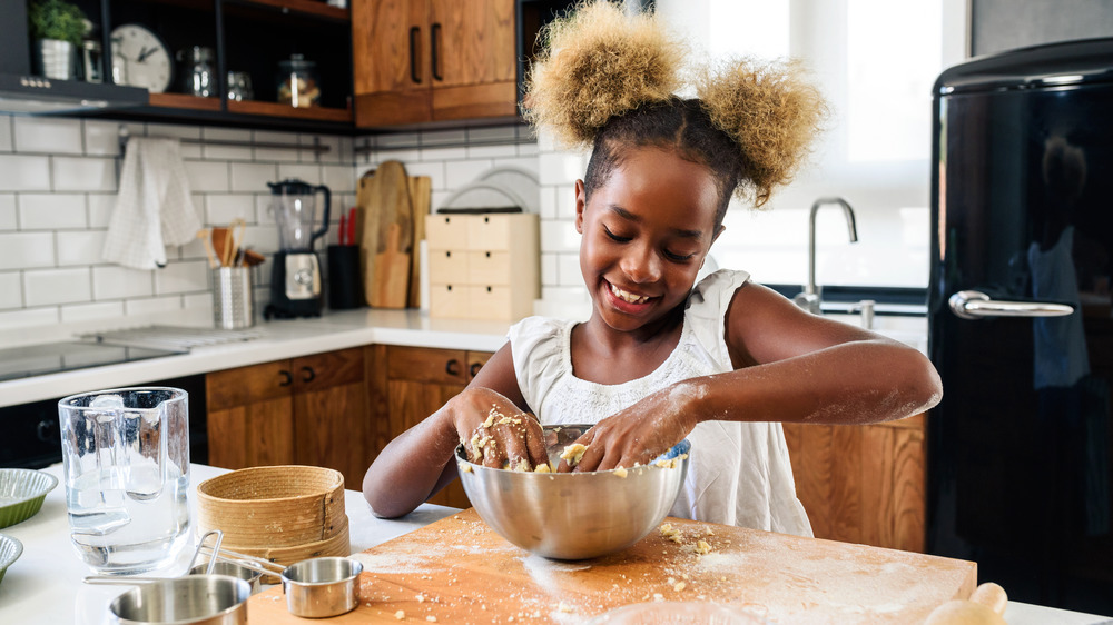 Girl making cookie dough