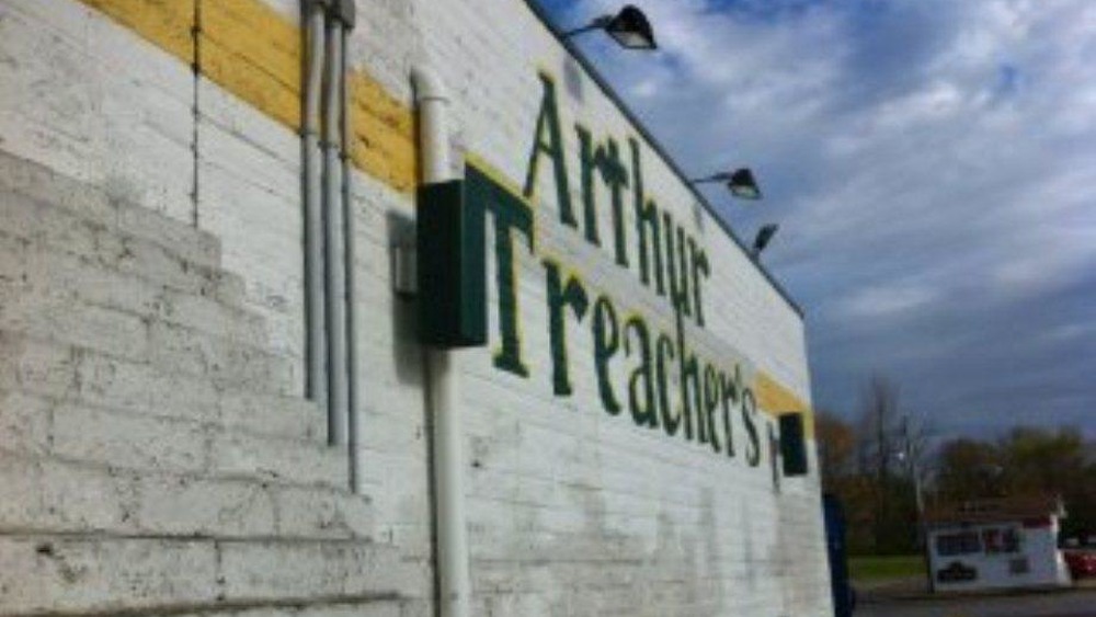 Arthur Treacher's sign on wall