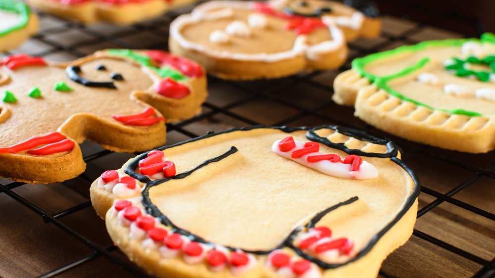 Ugly sweater and gingerbread men cookies, red and green icing