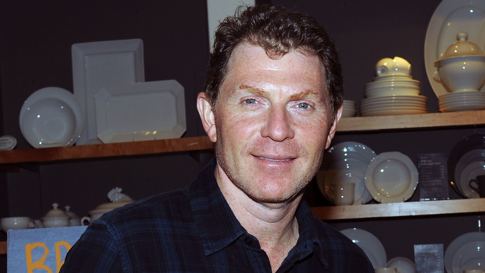 Bobby Flay in a dark checkered shirt