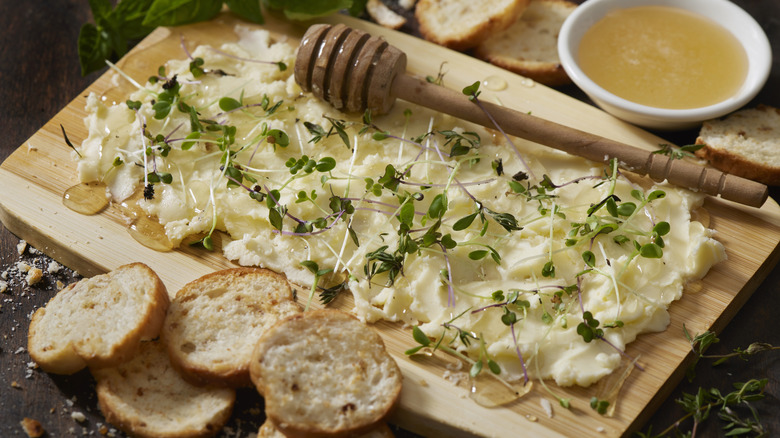 butter board with bread and honey