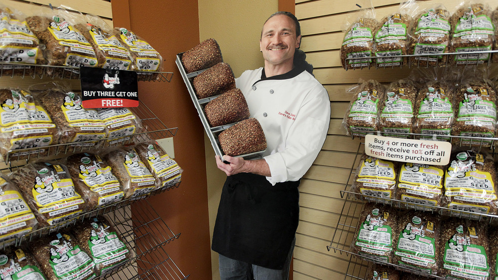 Rows of Dave's Killer Bread on grocery store shelf