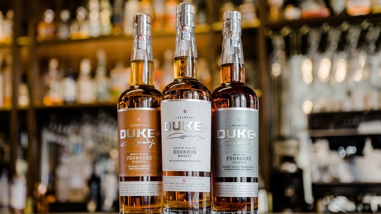 three bottles of Duke Spirits whiskey