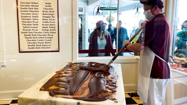 Worker making fudge