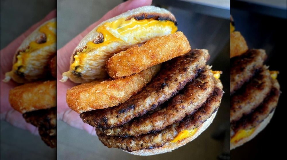 Huge sausage mcmuffin with hash browns