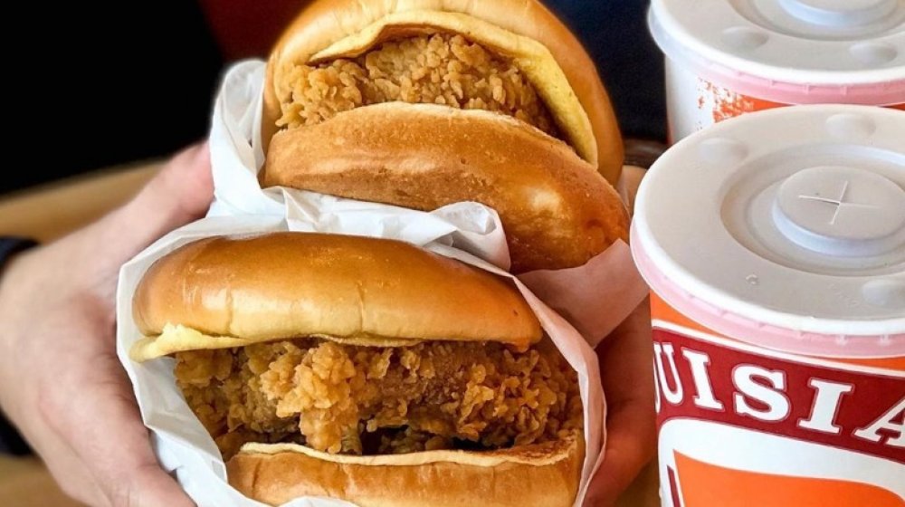 Popeyes chicken sandwiches and soda