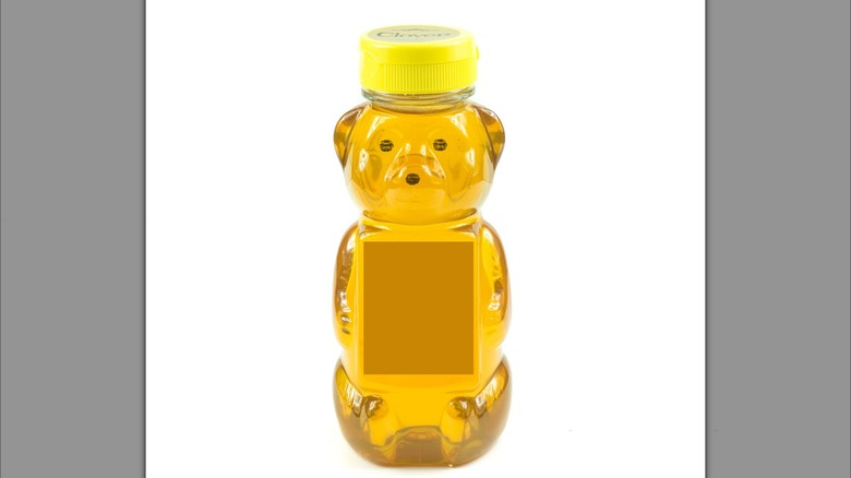 Bottle of honey shaped like a bear