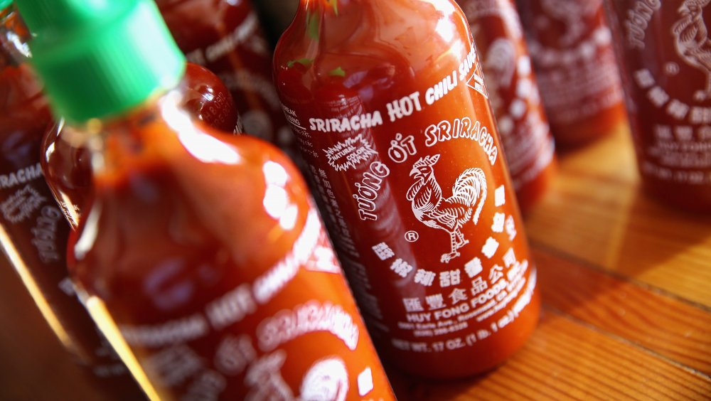 Bottles of sriracha