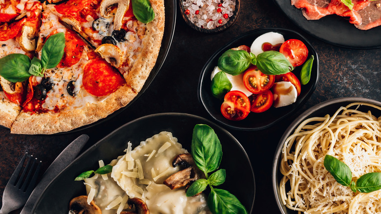 array of pizzas and pastas