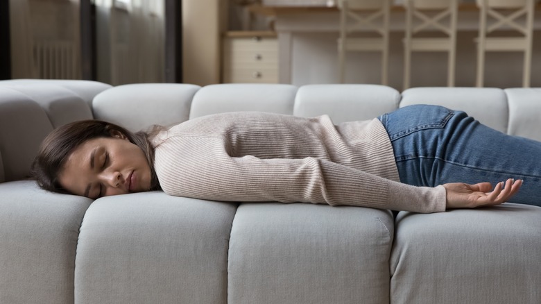 Person sleeping on a couch