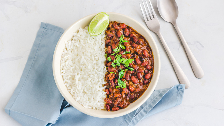 Rice and beans in bowl with lime