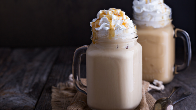 Iced coffee with syrup and whipped cream 