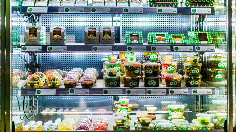 Packaged foods in a display case