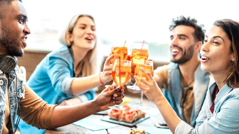 Friends enjoy a meal together